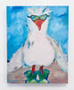 A canvas print of a white bird with a red beak, wearing green sunglasses and green shoes, set against a bright blue painted background.