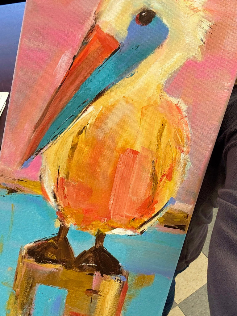 Colorful painting of a pelican on a blue background