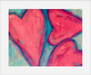Abstract art piece with pink and blue heart shapes
