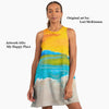 Woman wearing a dress with a colorful design, standing against a white background.