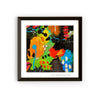 Framed abstract artwork with vibrant colors on a white background