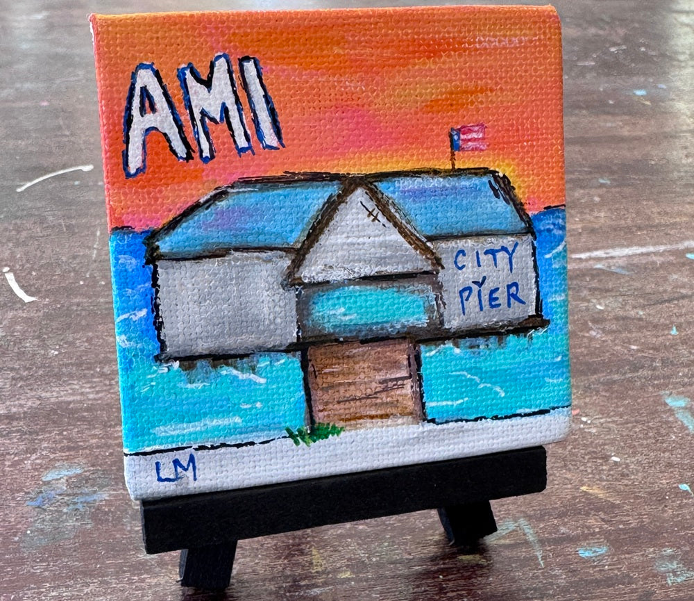a small painting with text 'AMI City Pier' featuring a building on a pier over water 