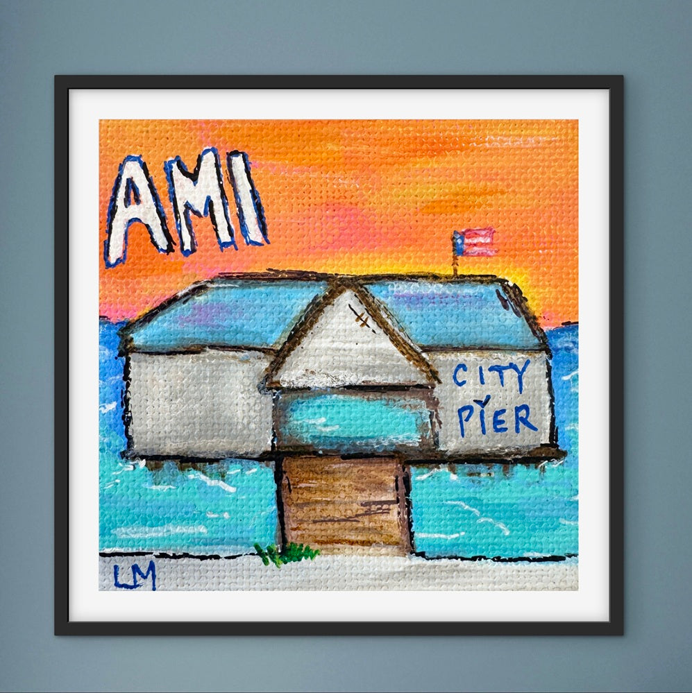 Framed artwork of a small building labeled 'City Pier' with 'AMI' text, on a blue background.