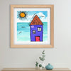 Framed art of a house with a sun and sea on a wall above a shelf.