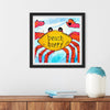 Framed artwork of a colorful crab with 'beach happy' text on a wall above a wooden shelf.