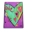 rectangular abstract art print featuring a large green heart with pink 'love' lettering and smaller pink hearts, set against a glittery purple background with black and yellow accents.