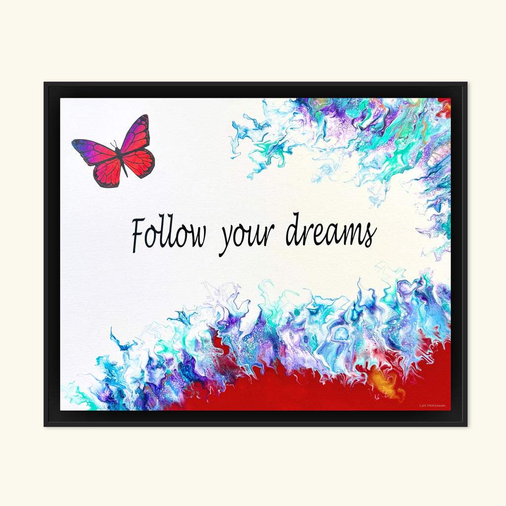 Framed artwork with a butterfly and 'Follow your dreams' text on a colorful abstract background.