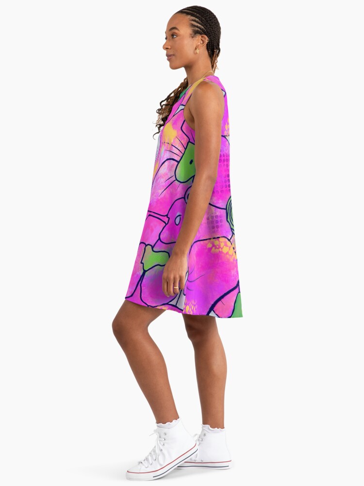 Side profile of a woman wearing a pink floral sleeveless dress
