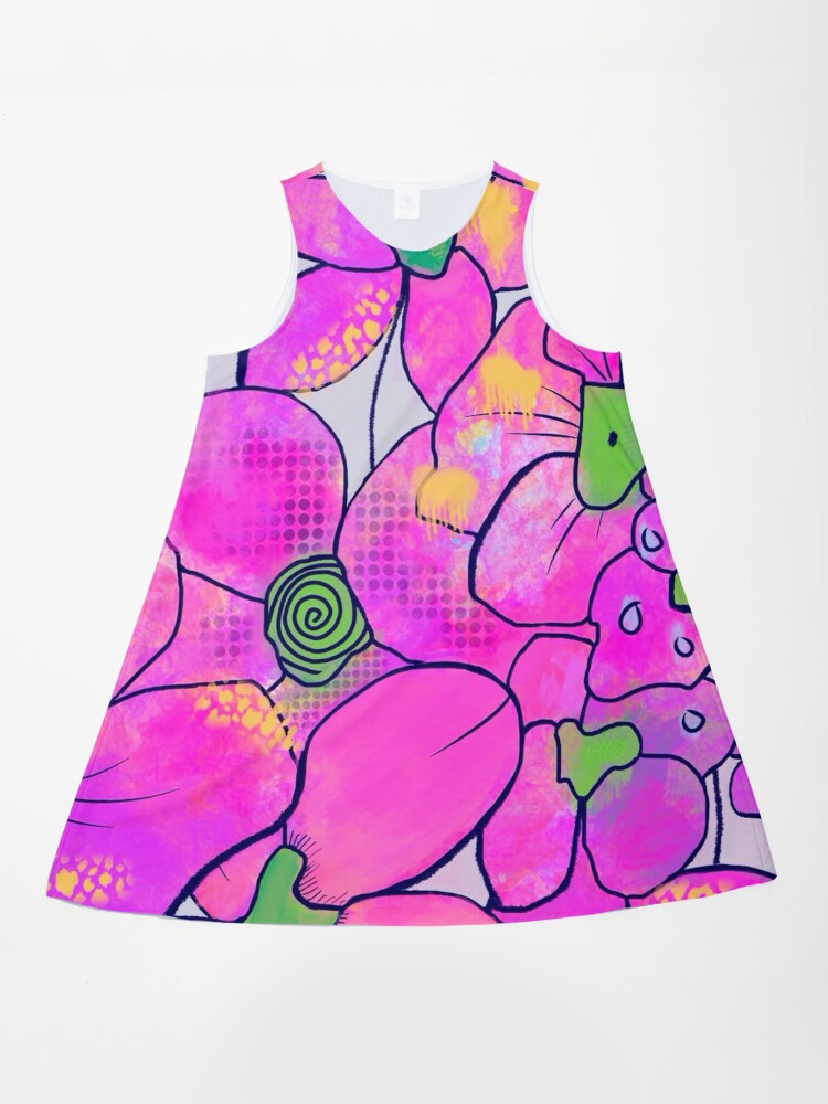 A pink floral sleeveless dress on a white surface