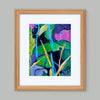 Vibrant painting with leaves, branches and a bird displayed in a wooden frame with a white mat on a pale gray wall