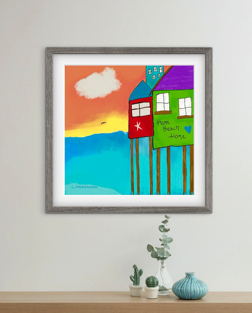 beach house artwork in gray frame with desk below
