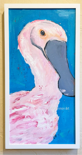 Framed artwork of a pink Spoonbill on a blue background