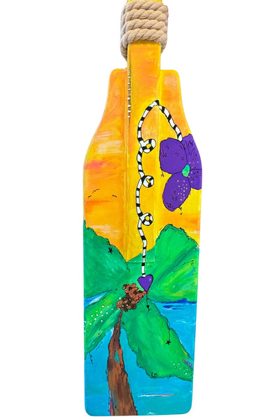 painted oar with palm tree and flower