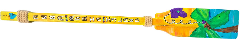 colorful hand painted boat oar with beach scene and text 'Anna Maria Island'
