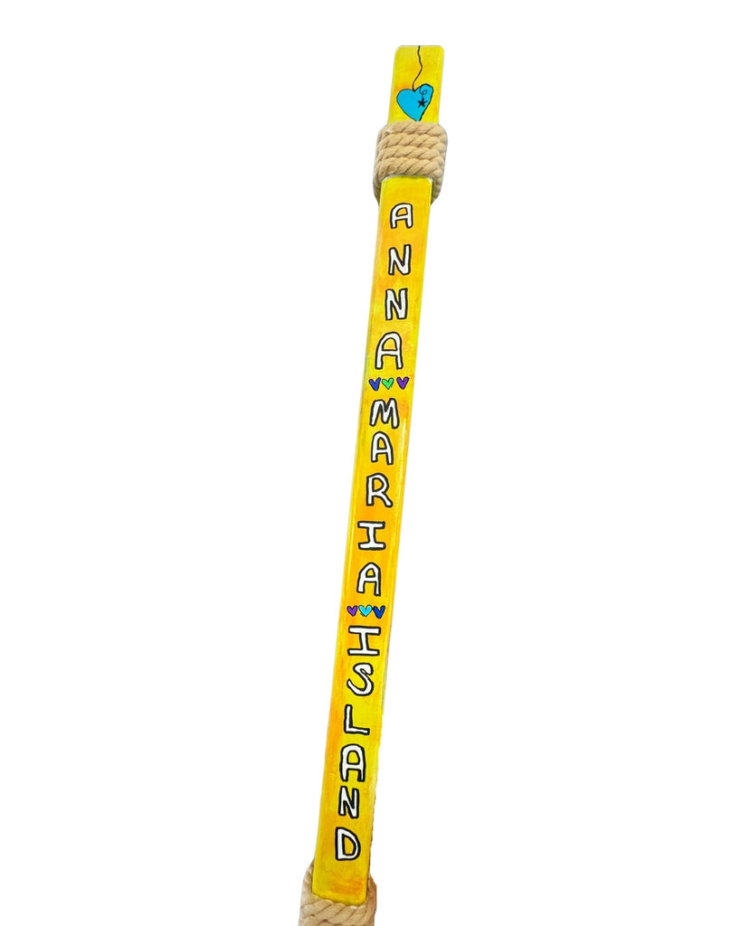 Anna Maria Island text painted on the handle of an oar