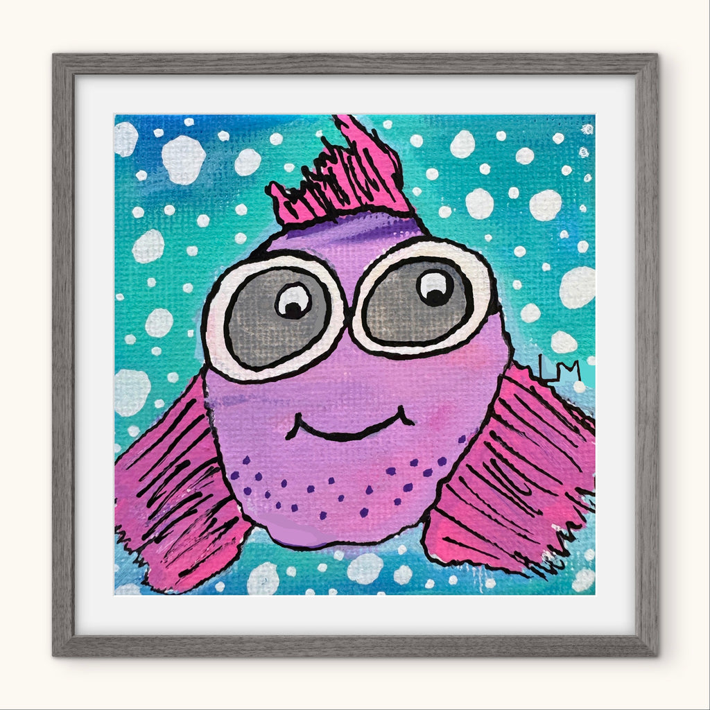 Framed artwork of a purple fish with pink fins on a blue background with white polka dots.