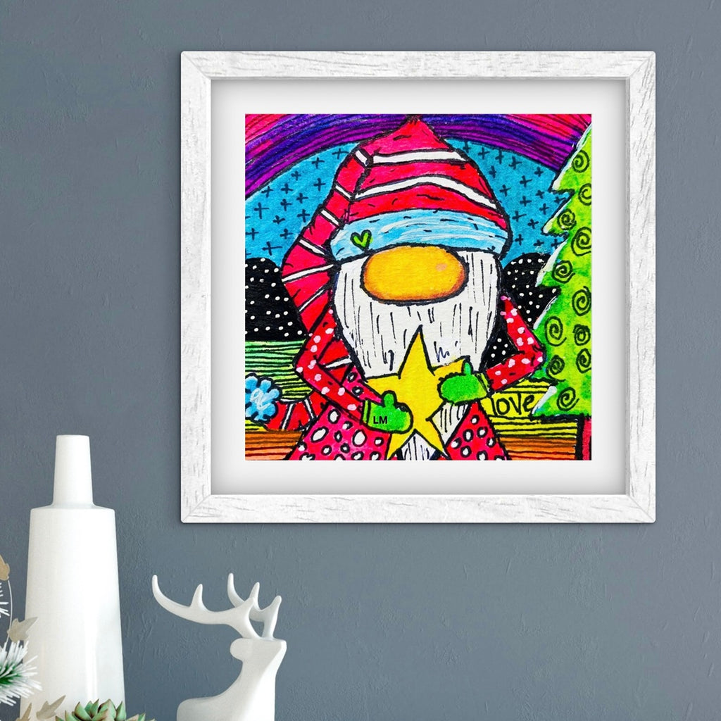 Framed colorful artwork of a gnome on a gray wall with decorative items.