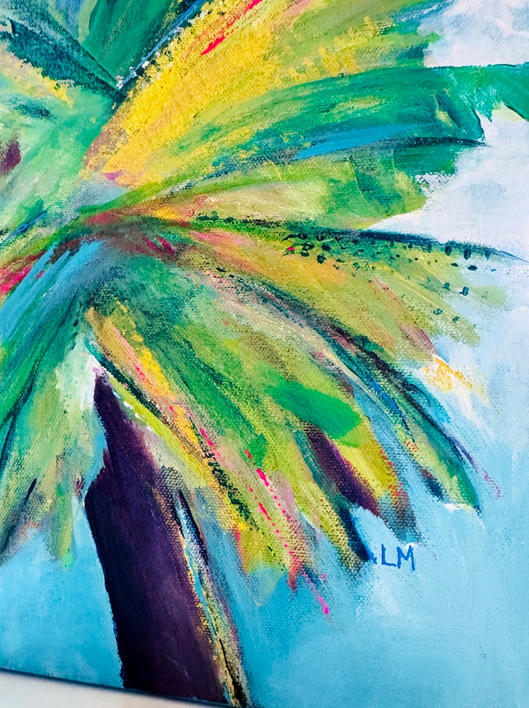 close up of colorful palm tree painting on a square canvas against a white wall. It shows the artist's initials 'LM'
