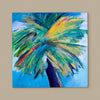 colorful palm tree painting on a light beige wall