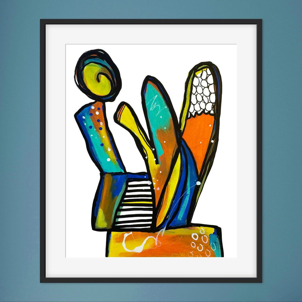 Framed abstract artwork with colorful shapes on a blue wall