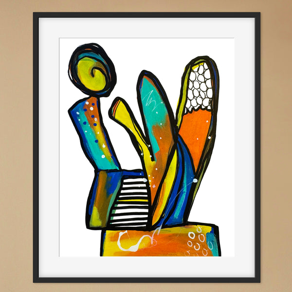 Framed abstract artwork with colorful shapes on a beige wall