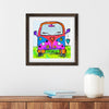 Framed colorful artwork of a van with peace sign on a white wall above a wooden shelf.