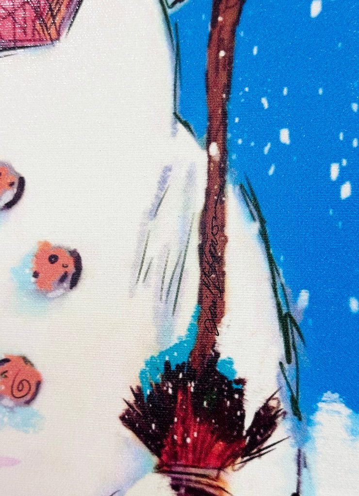 Close-up of a colorful winter illustration featuring a snowman with orange buttons, a brown broom, and a bright blue snowy background. Shows the artists signature, Lori McKinnon