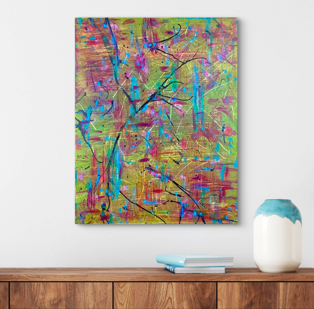 Abstract painting with colorful brush strokes on a wall above a wooden shelf.