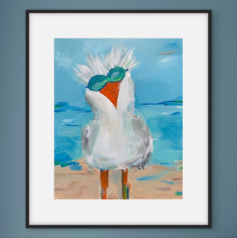 Framed artwork of a bird with a blue background