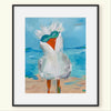 Framed painting of a seagull wearing sunglasses on a beach with a blue sky.