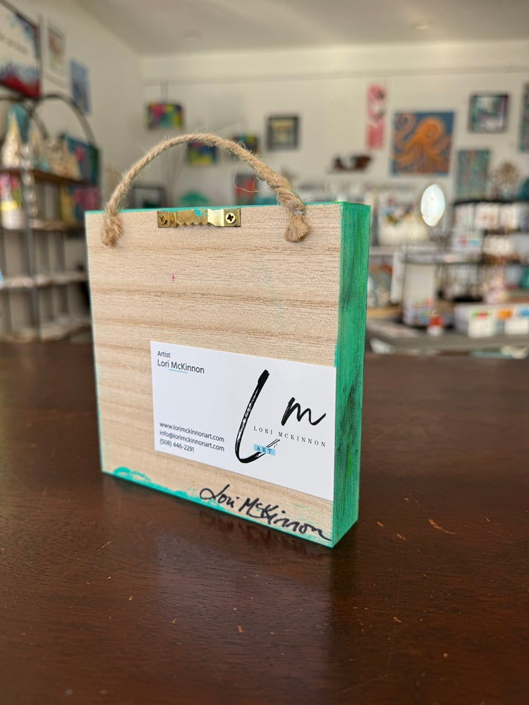 back of signed artwork