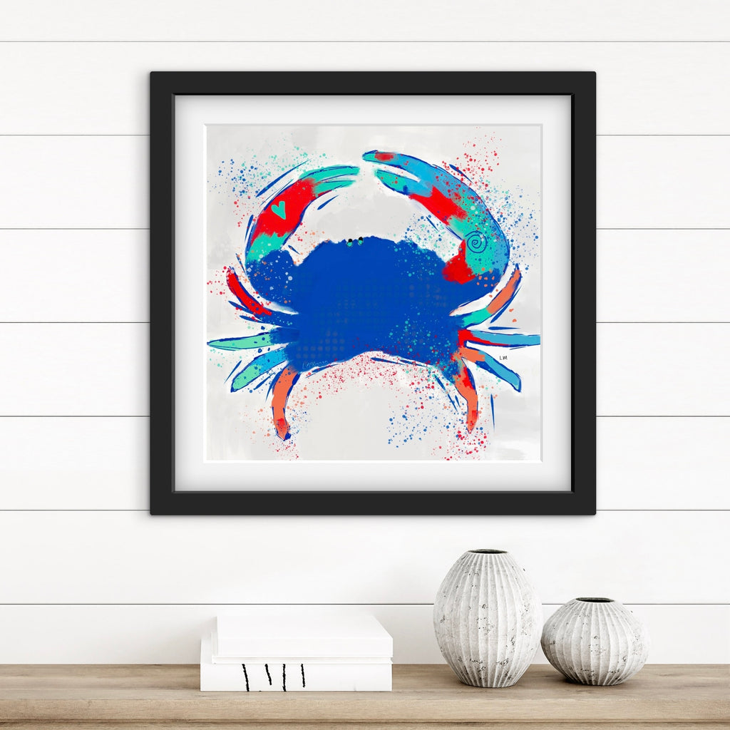 Framed artwork of a colorful crab on a white wall with decorative vases below.