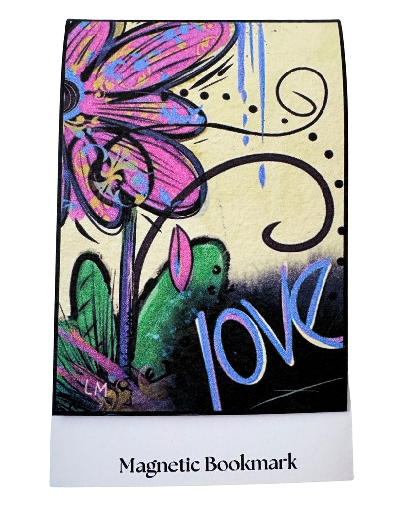 A rectangular magnetic bookmark with a colorful artistic design featuring a pink flower, green leaves, black swirls, and the word 'love' in blue, above a white strip labeled 'Magnetic Bookmark'.