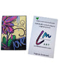 A custom magnetic bookmark featuring colorful abstract floral artwork shown next to a paper with printed text and the artist's name Lori McKinnon.