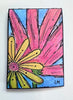 A colorful art print on a white textured background, featuring a stylized flower with yellow petals, a pink center, and large pink leaves against a blue sky. Signed 'LM' in the bottom right corner.