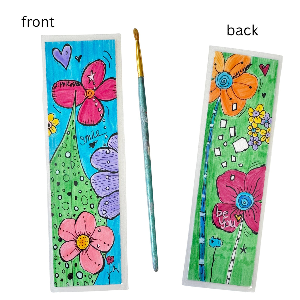 Colorful bookmark with floral designs on front and back