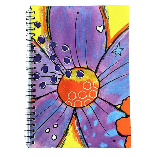 Colorful notebook with a flower design on a white background