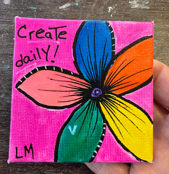 Small square canvas with a colorful flower painting and 'Create daily!' text on a pink background with magnet on back
