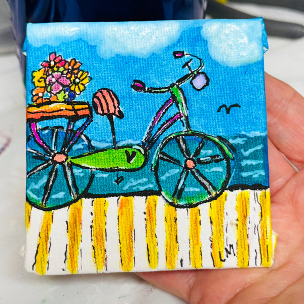 beach cruiser bike with flower basket