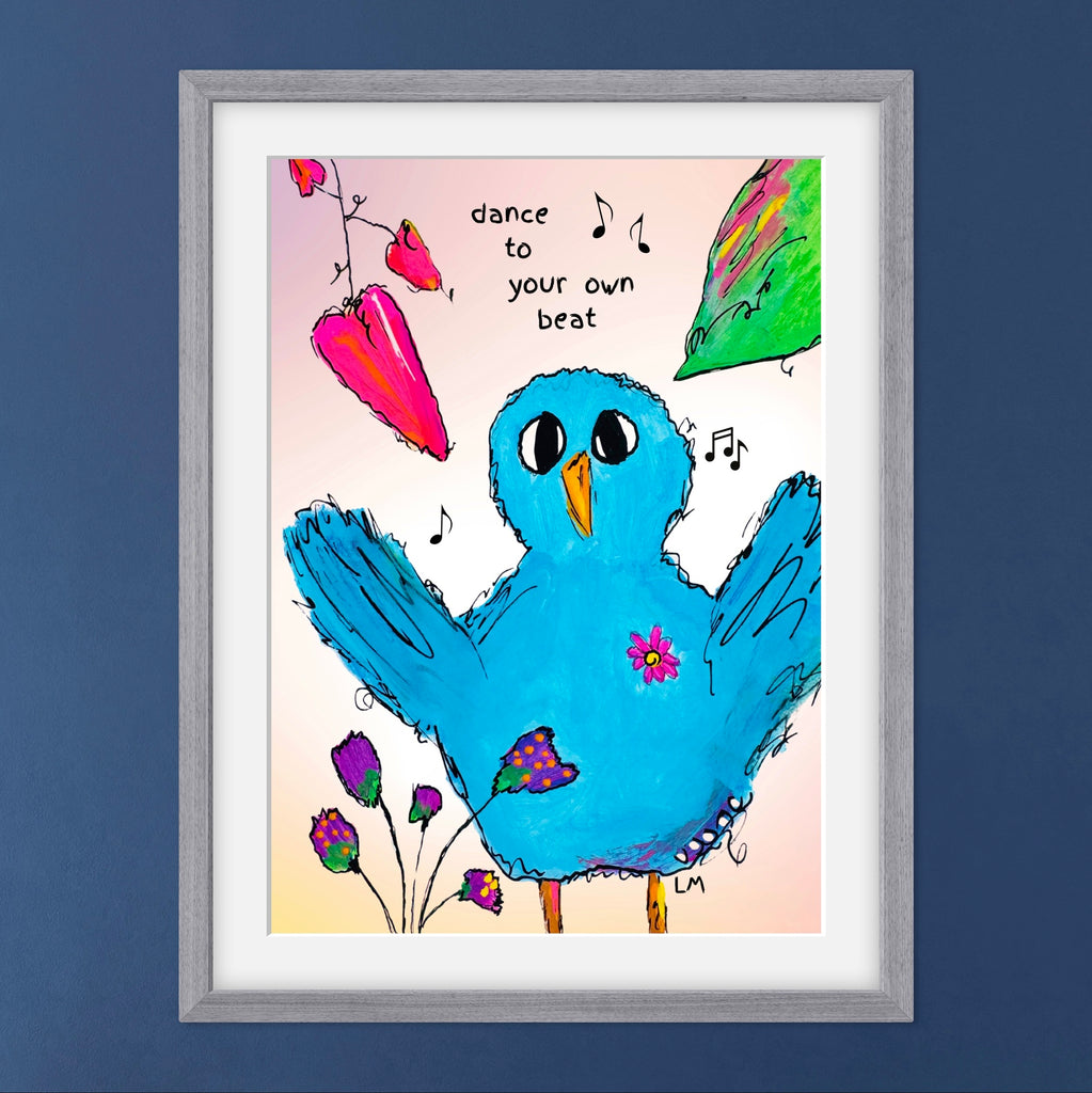 Framed artwork of a blue bird with musical notes and flowers on a blue wall.