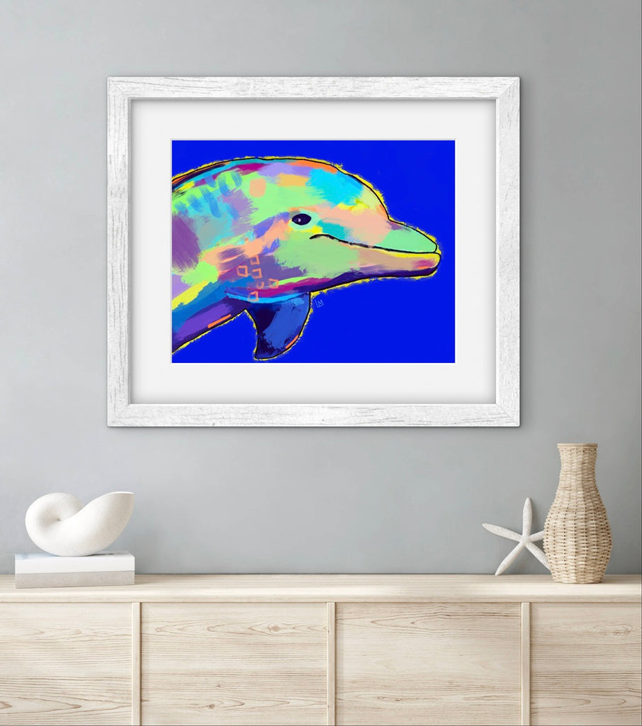 Framed colorful dolphin artwork on a gray wall above a wooden cabinet.