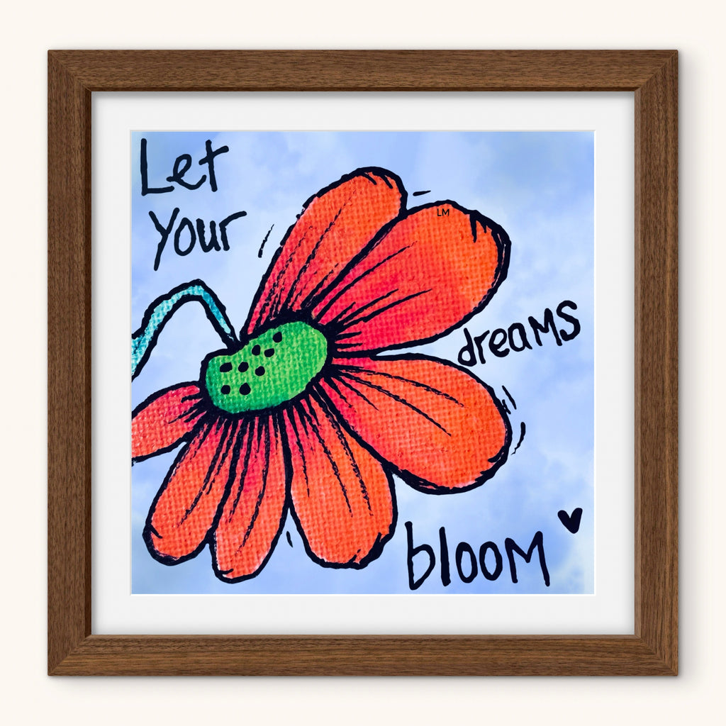 Framed artwork with a red flower and motivational text on a blue background
