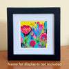 Colorful original floral painting in a white mat, shown in a black frame on a wooden tabletop. Frame shown for display only, not included.