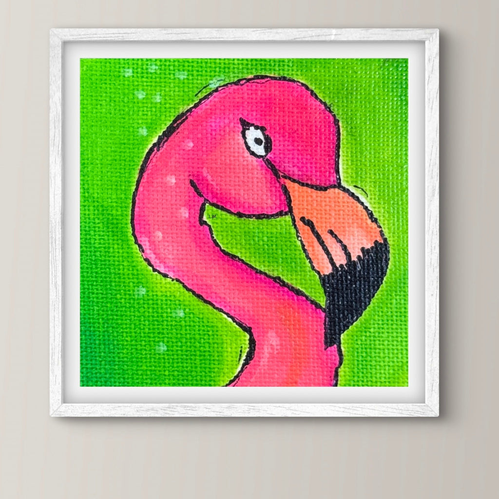 Framed artwork of a pink flamingo on a green background