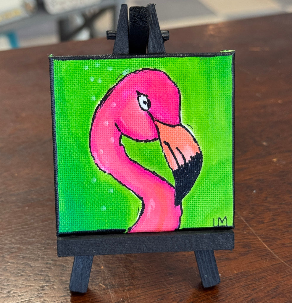vibrant pink flamingo on green background