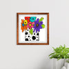 Framed artwork with colorful flowers on a white wall.