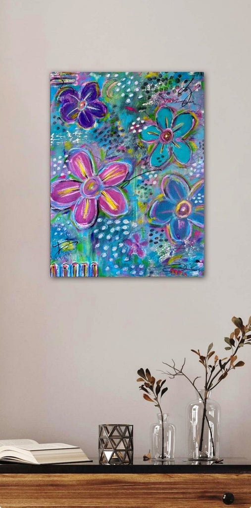 Colorful floral painting on a wall above a wooden shelf with decorative items.