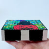 Halloween painting on a wood block and the sides are all painted with black and white stripes