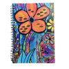 Colorful notebook with a floral design on a white background