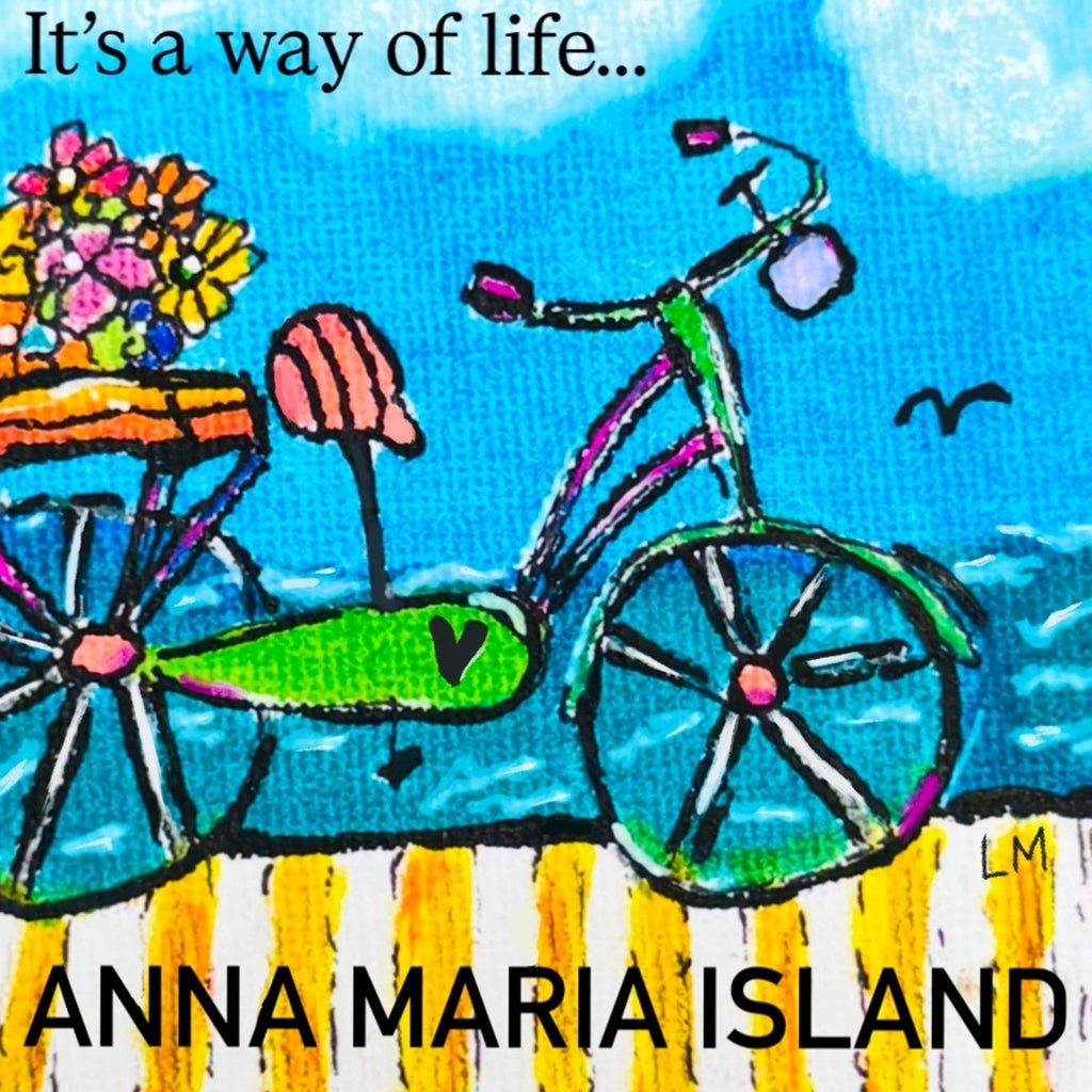 bicycle on a pier with writing Anna Maria Island
